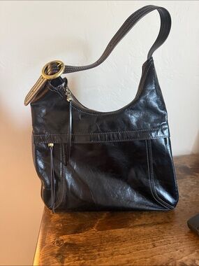HOBO Black Leather Shoulder Bag with Gold Ring Accent